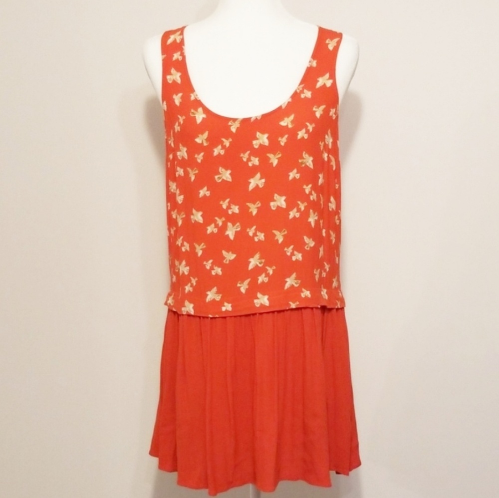COOPERATIVE orange peplum blouse